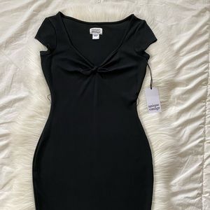 Unique Vintage Black Bow Dress